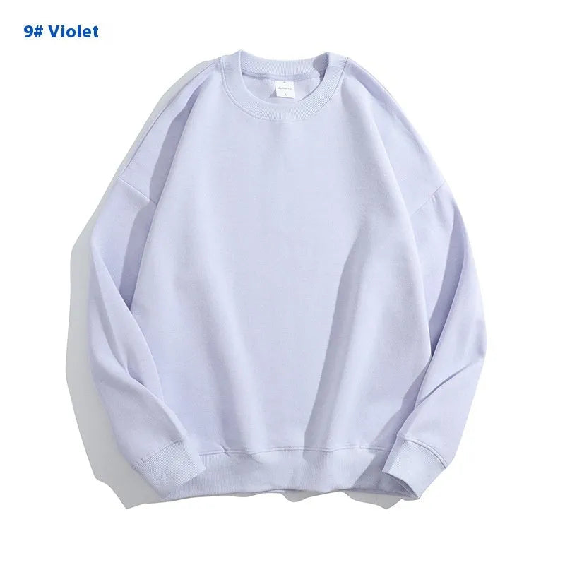 Women's loose fit cotton off shoulder sweater in a solid colour with round neck and long sleeves.
