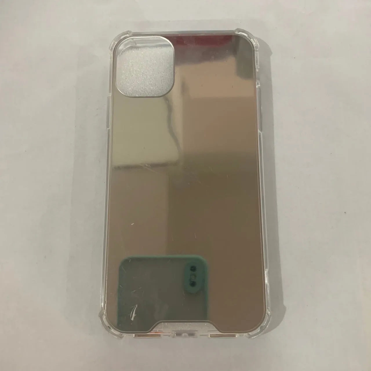 Mirror finish TPU protective case shown on iPhone with colour options displayed.