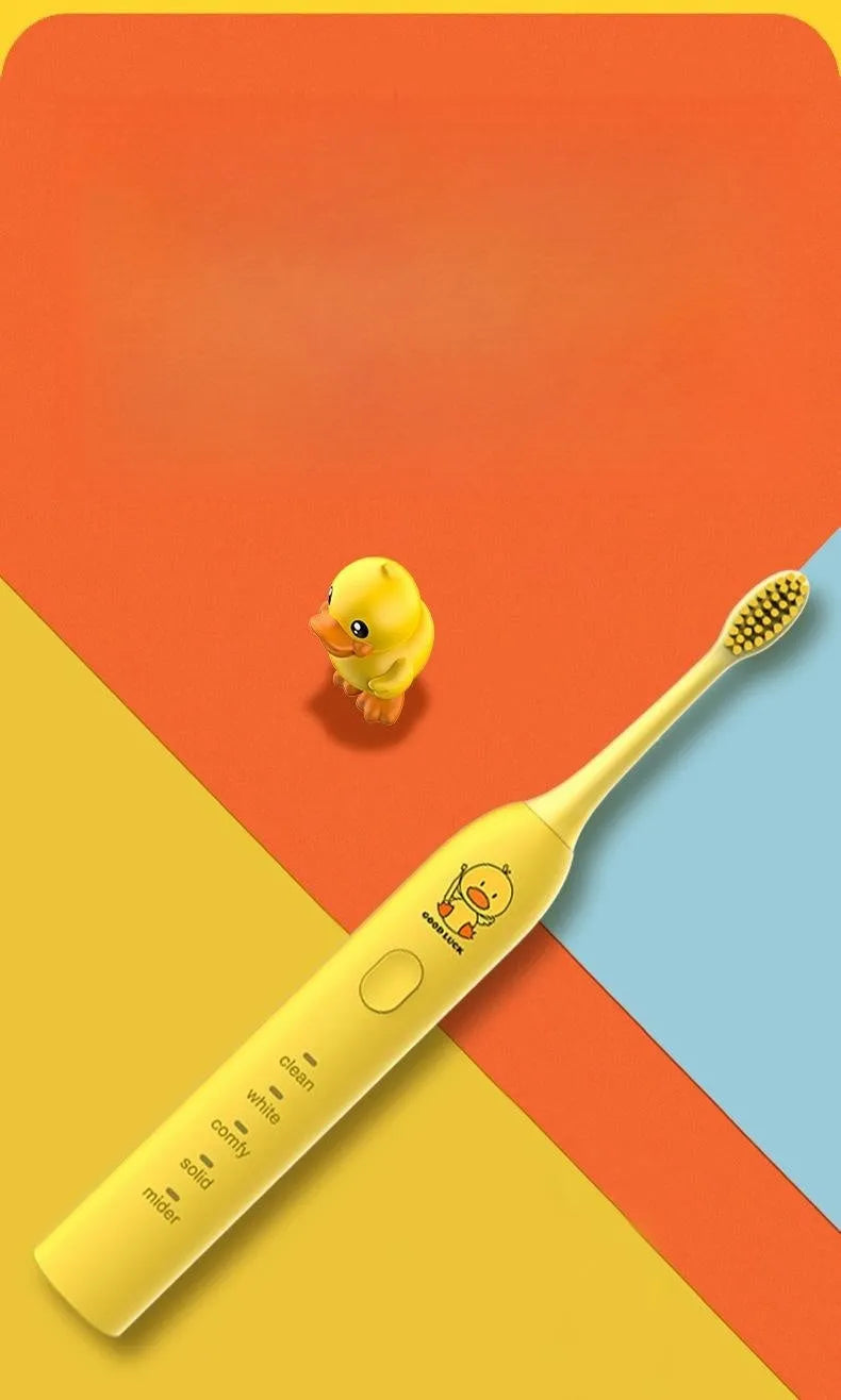Small yellow duck electric toothbrush with soft bristles and USB charging in green pink and yellow colours