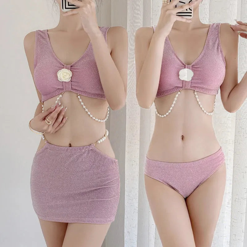 Women's pink and black polyester three-piece bikini swimsuit with high elasticity construction