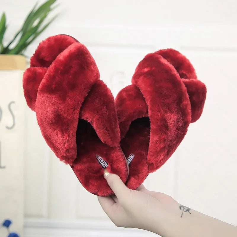 Women's black cross open-toe fur slippers with a patterned anti-slip sole.