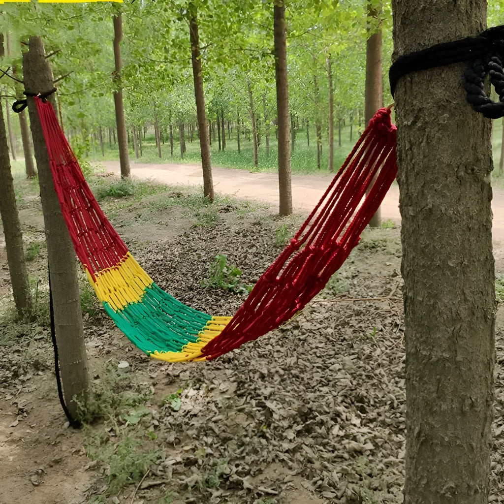 Outdoor nylon rope mesh hammock showing bold weave style, displayed with included tying ropes.