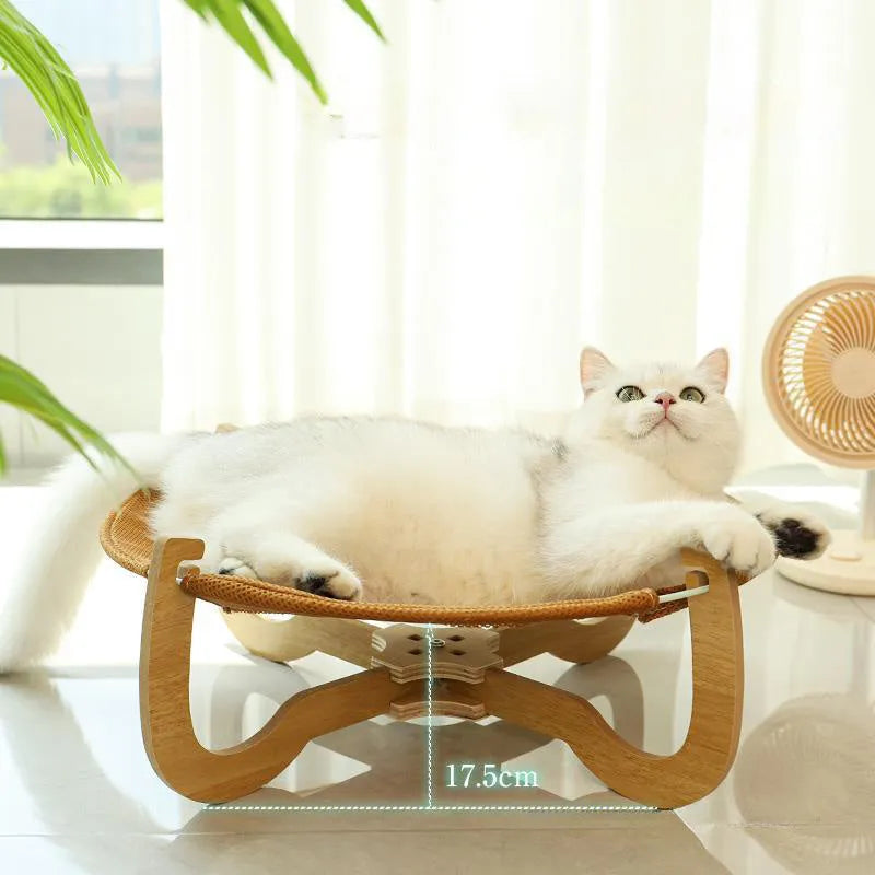 Brown woven rattan pet hammock bed measuring 46cm square raised off the ground