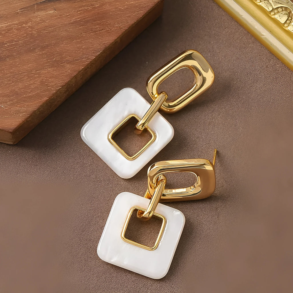Geometric square hollow earrings with chamfered corners in electroplated copper