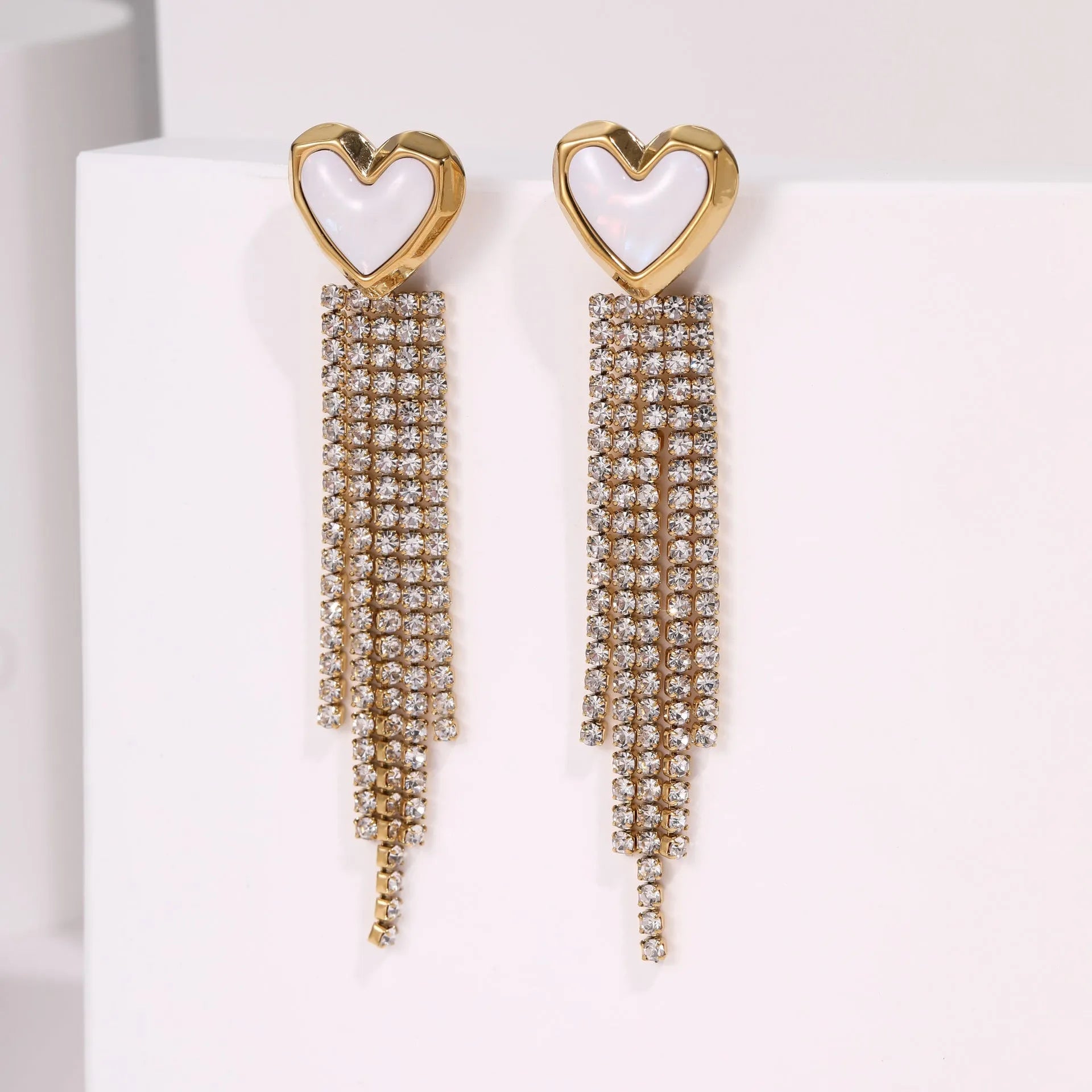Gold plated geometric earrings for women featuring heart and star shapes with a diamond tassel.