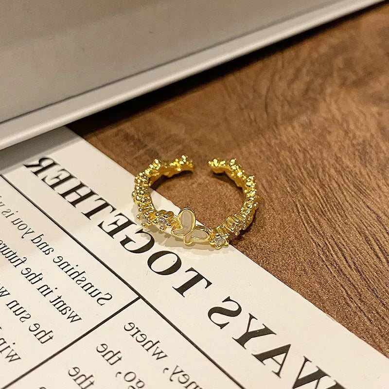 Creative Chinese butterfly women's copper ring with dripping oil treatment process in simple style.