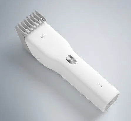 Black and white cordless hair clippers with ceramic blade and adjustable slider comb