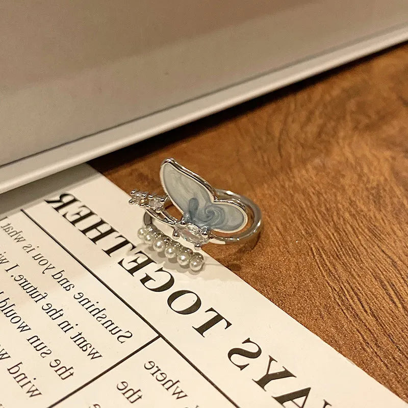 Creative Chinese butterfly women's copper ring with dripping oil treatment process in simple style.