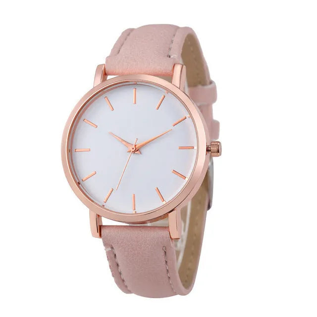Square-faced quartz watch with an alloy case and PU leather strap on a wrist.