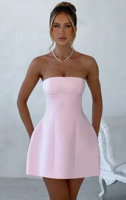 Women's solid colour backless tube dress with high waist and A-line short skirt.