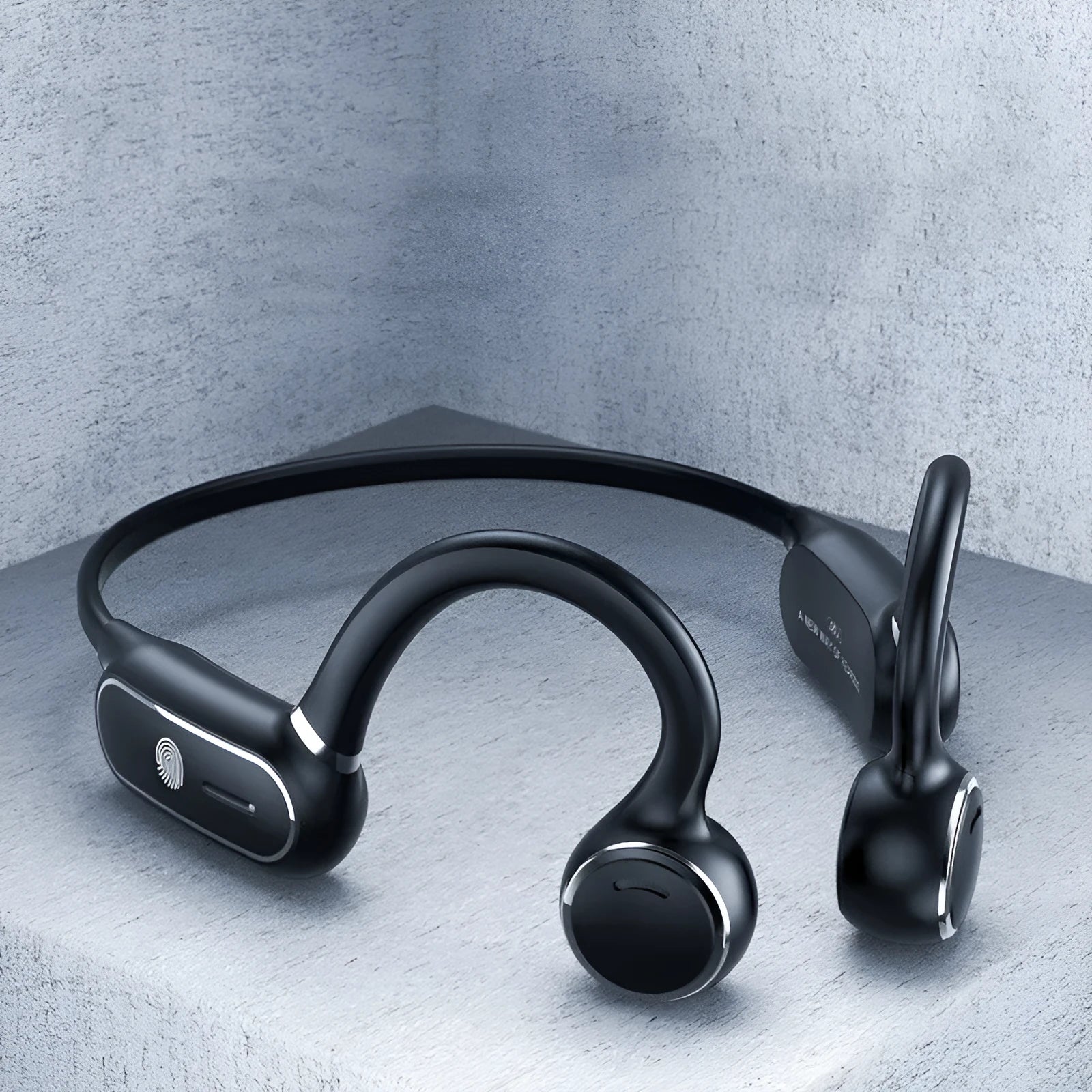 Black air conduction wireless earphones with a titanium alloy hook frame displayed on a white background.