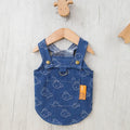 Denim princess dress for small dog on hanger showing bracket detailing and lightweight construction