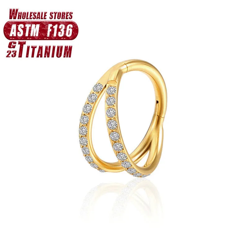 Titanium alloy fork nose ring for body piercing in silver colour on a grey background.