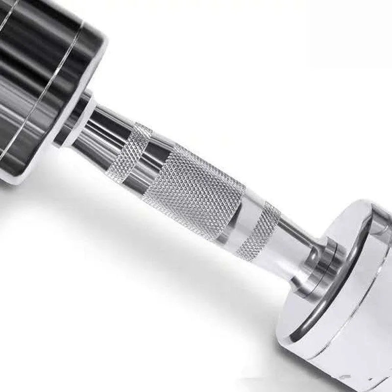 Silver electroplated pure steel dumbbell on a grey background, showing ergonomic handle.