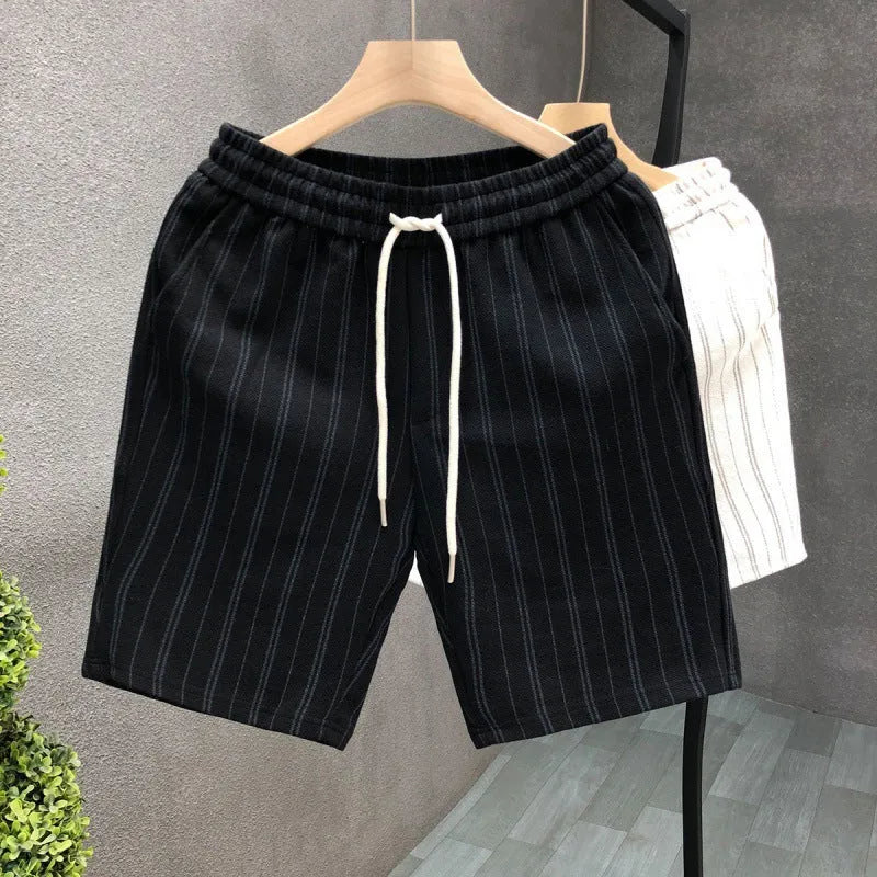 Men's black and white striped casual shorts with a fleece lining and double-layer waistband.