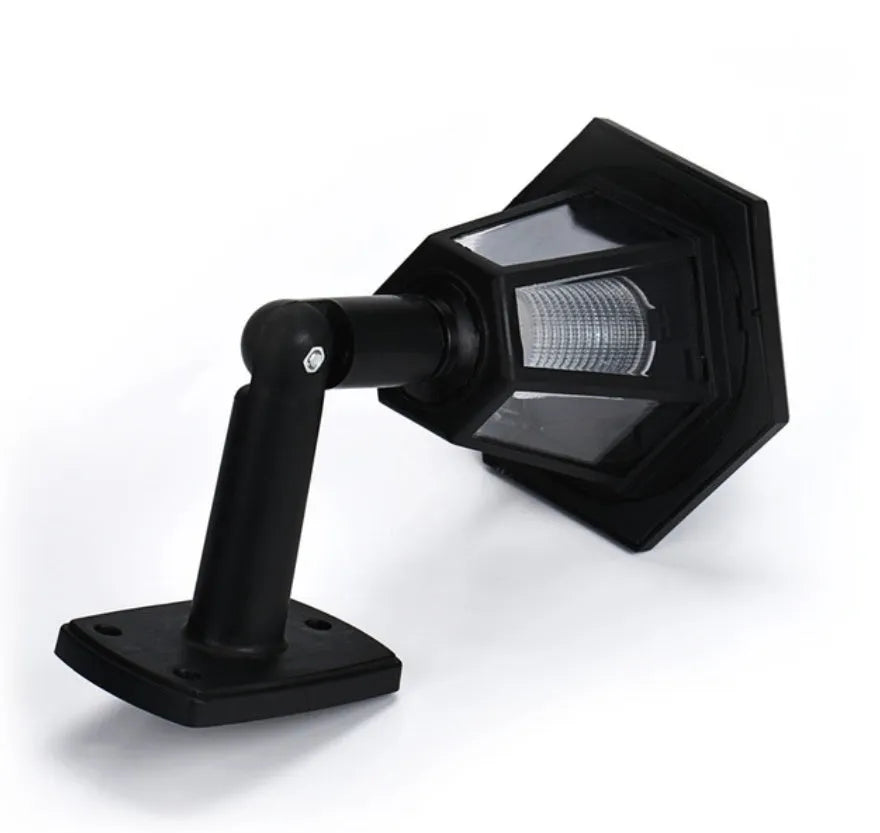 Black hexagonal solar wall lamp with light sensor for outdoor garden lighting