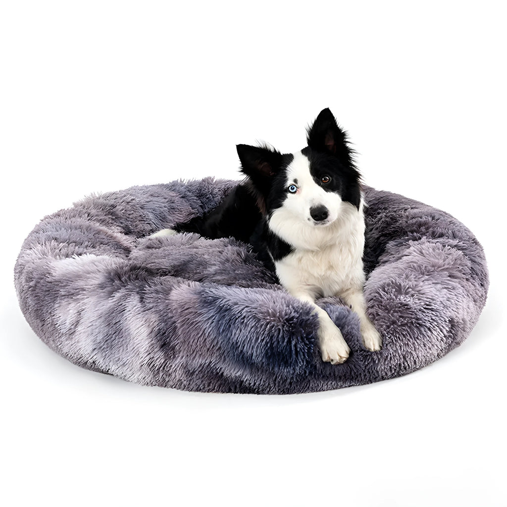 Donut-shaped long plush pet bed with raised sides, shown in a neutral colour.