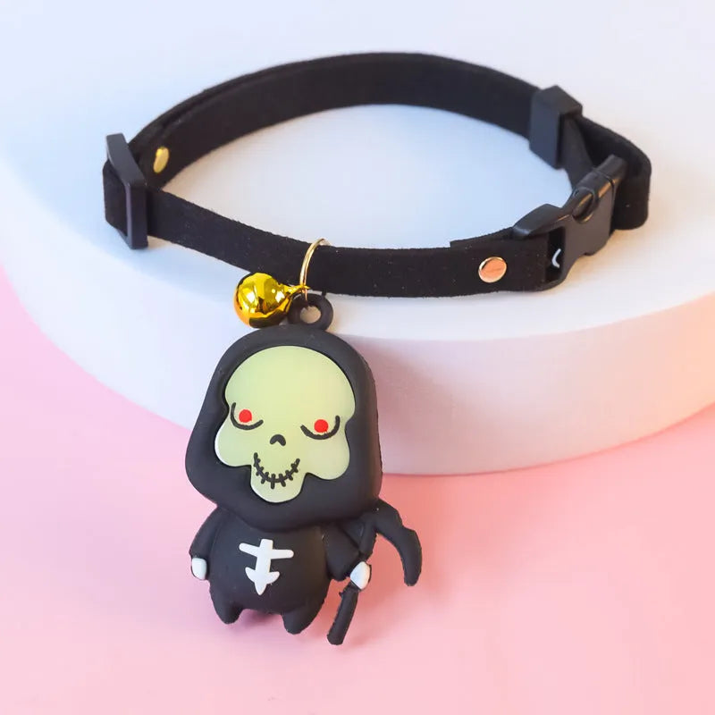 Halloween dog collar decoration in luminous ghost, luminous skull, or pumpkin man patterns on a polyester band.