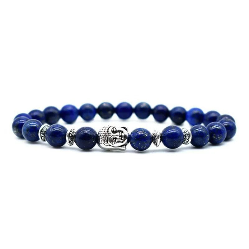 Handcrafted unisex bracelet with a 19mm Buddha head bead in tiger eye stone on wrist.