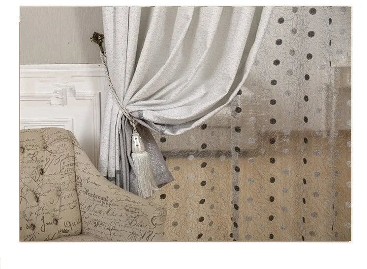 Single plain blackout curtain panel with hook tape heading, shown against a window.