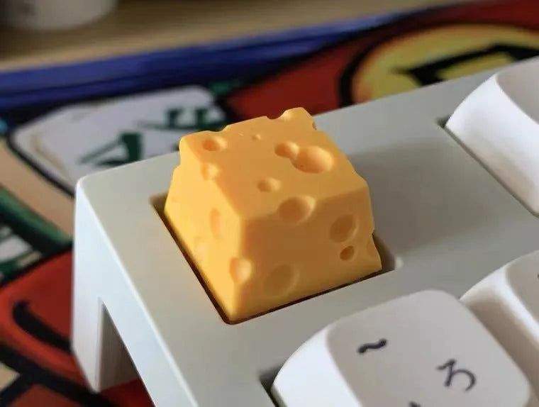 Yellow resin cheese-themed artisan keycap for mechanical keyboards with Cherry MX compatibility