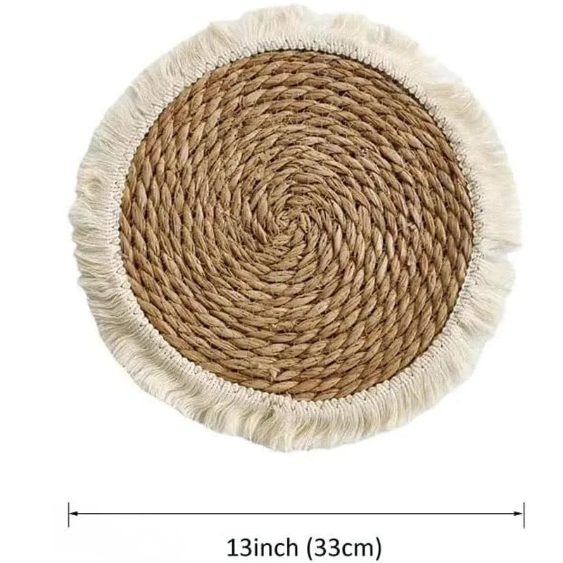 Round papyrus straw placemat with decorative tassels in modern solid colour design