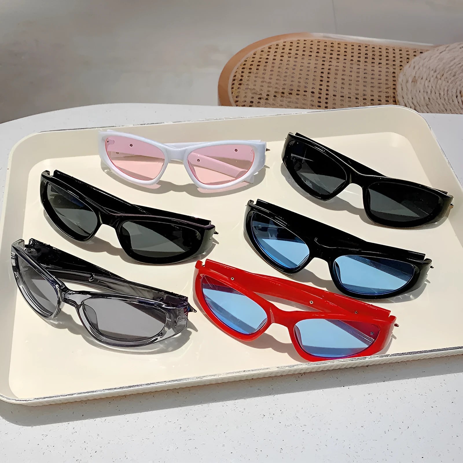 Sports sunglasses with PC frame and lenses in black and blue colour combination showing special-shaped mirror design