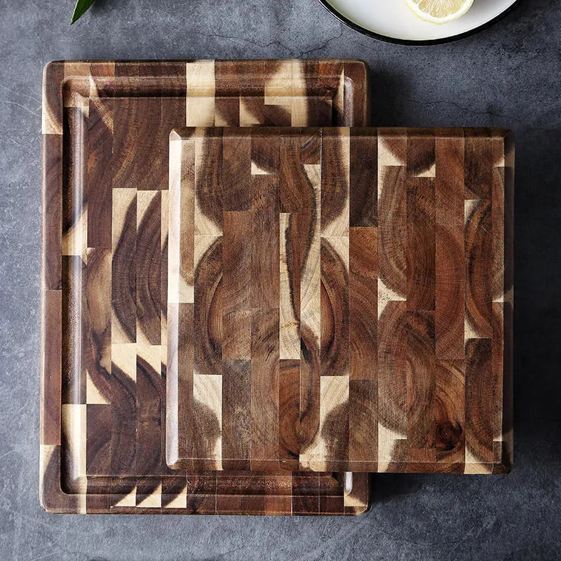 Brown acacia wood parquet cutting board with 3cm thickness on kitchen counter