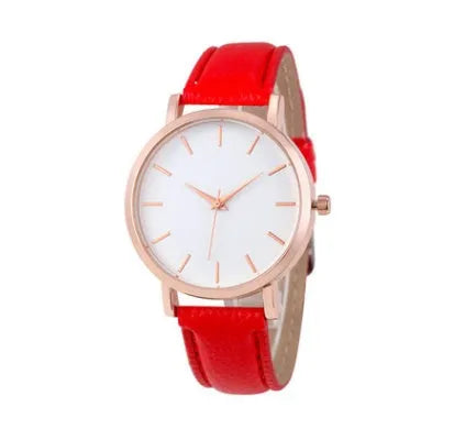 Square-faced quartz watch with an alloy case and PU leather strap on a wrist.