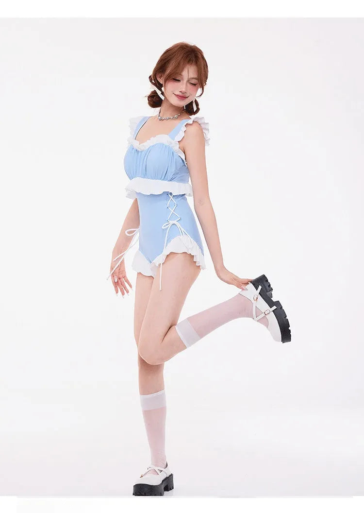 Light blue women's one-piece swimsuit with lace chest gathers, high waist, and backless design.
