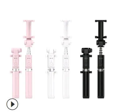 Aluminium alloy Bluetooth tripod selfie stick with remote control extended, holding a mobile phone.