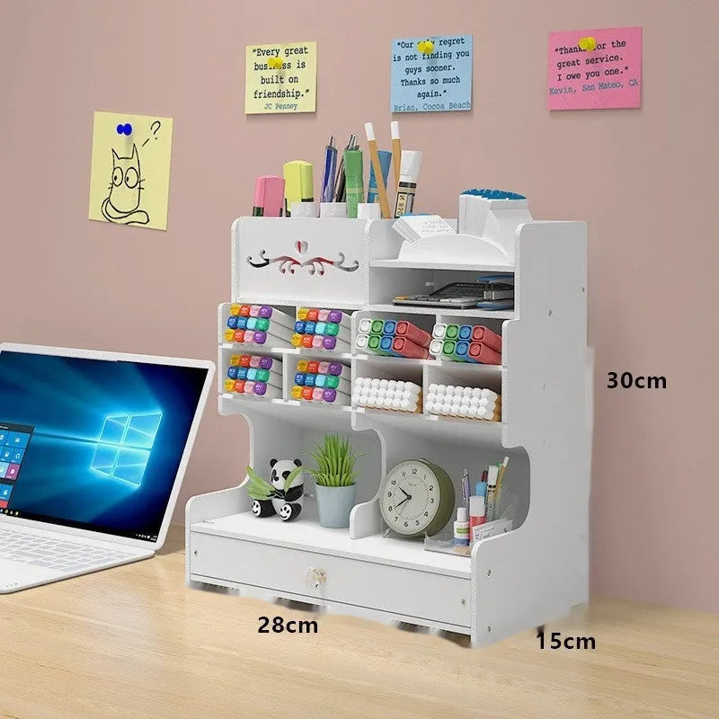 Square plastic pen holder storage box with multiple oblique insertion compartments on a desk.