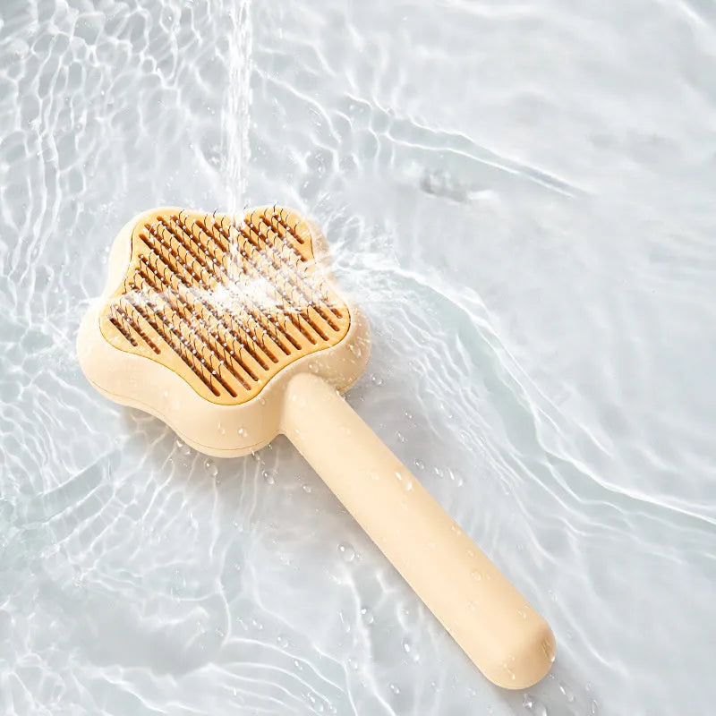Green self-cleaning cat comb with stainless steel needle pins for pet grooming