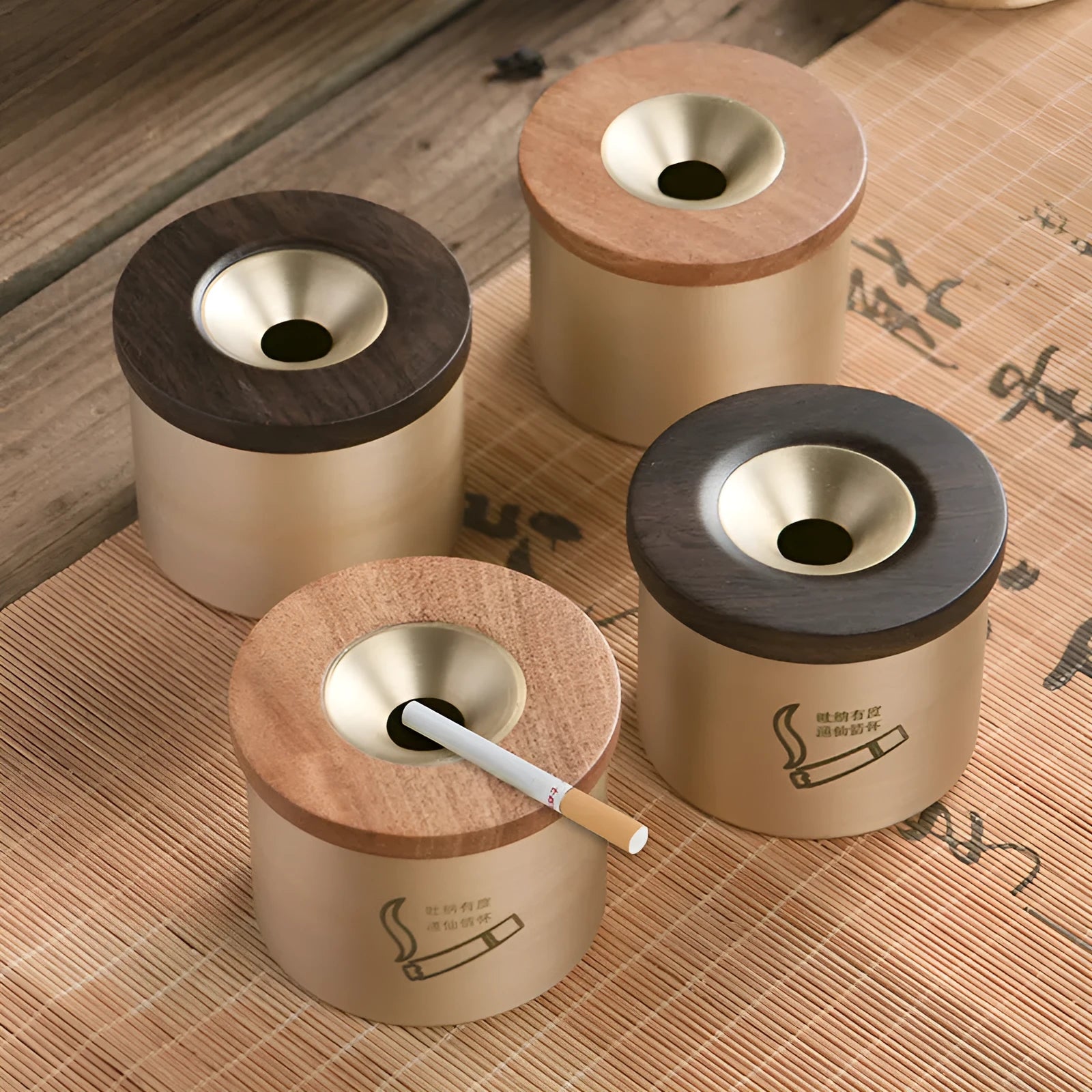 Brass ashtray with wooden lid in copper construction showing centre hole design