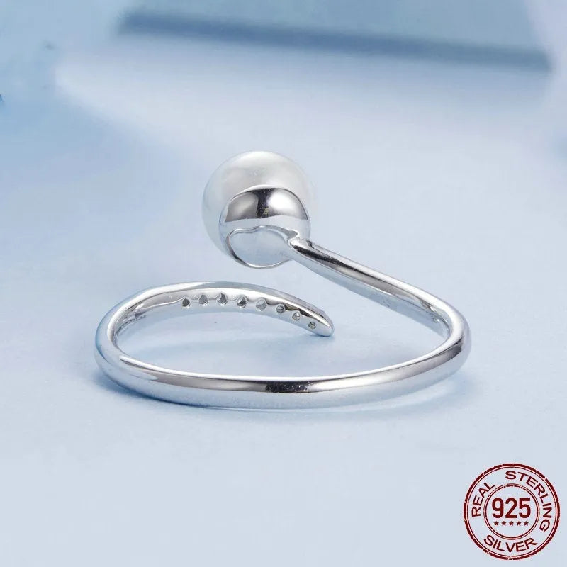 S925 sterling silver adjustable ring with natural shell pearls and opening loop design