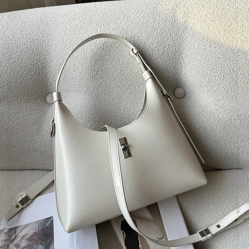 Genuine leather dumpling-shaped crossbody bag with multiple compartments in apricot colour