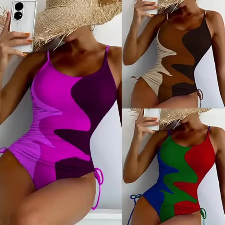 Women's sleeveless one-piece swimsuit in blue with backless design and striped pattern