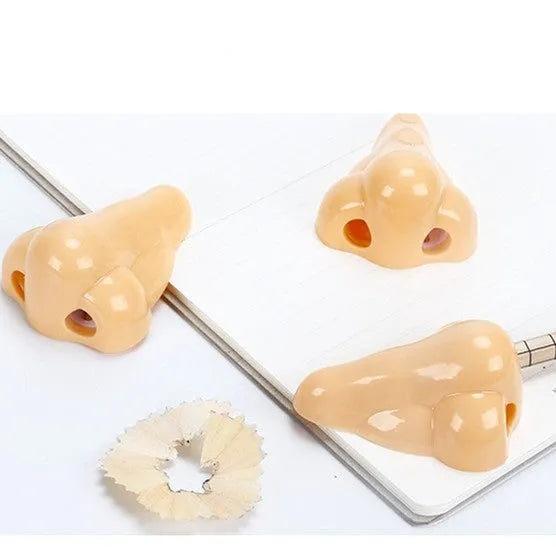 Flesh colour plastic manual pencil sharpener with geometry shape and big nostril hole