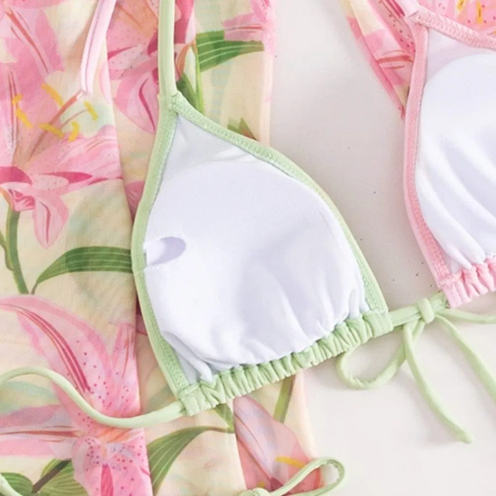 Women's printed bikini swimsuit set with bra and briefs on a mannequin.