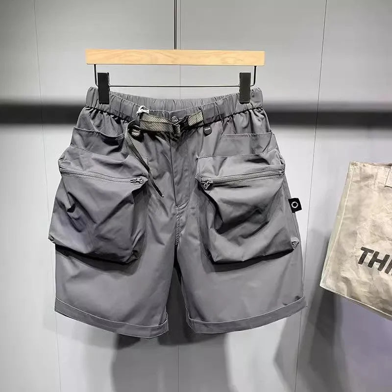 Men's large size work shorts with pockets in black or grey with loose fit design