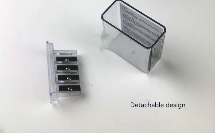 Geometric shaped four hole pencil sharpener for art, shown with integrated screwdriver.