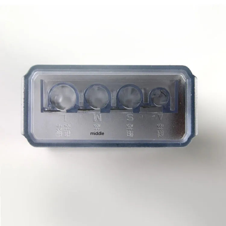Geometric shaped four hole pencil sharpener for art, shown with integrated screwdriver.