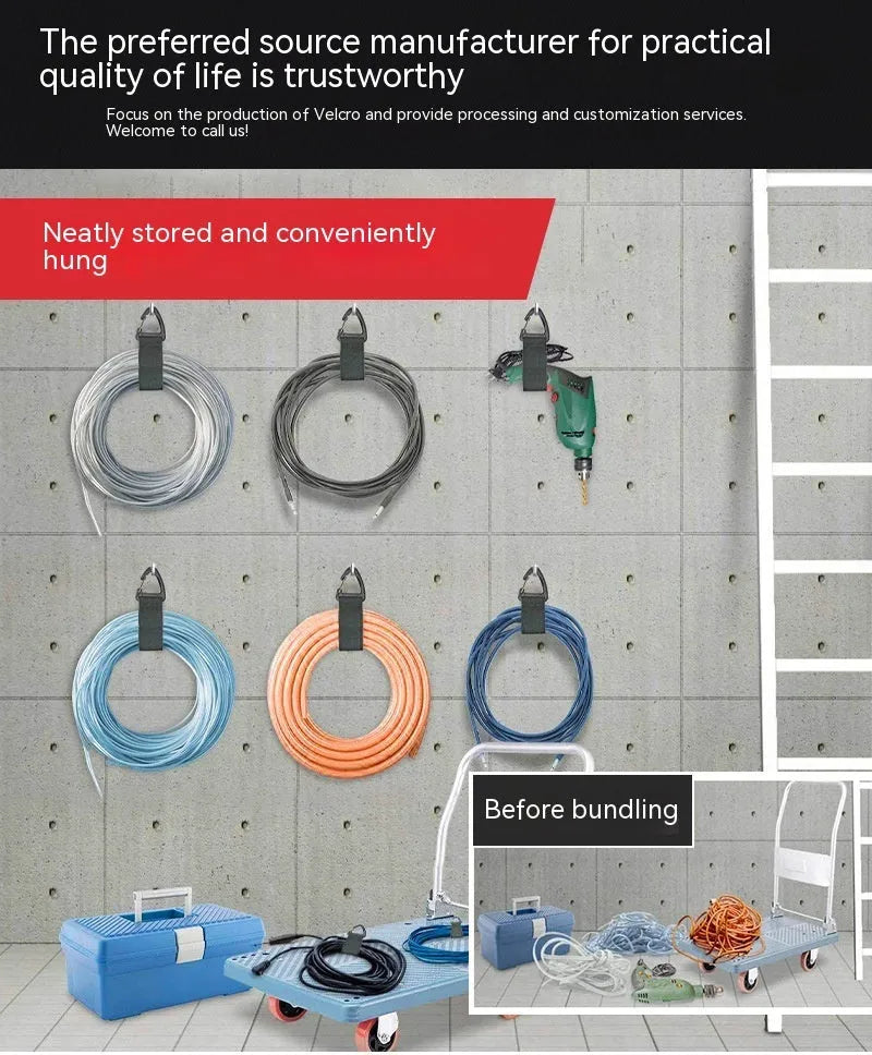 Black heavy-duty adjustable storage strap with metal carabiner clip for garage workshop organisation.
