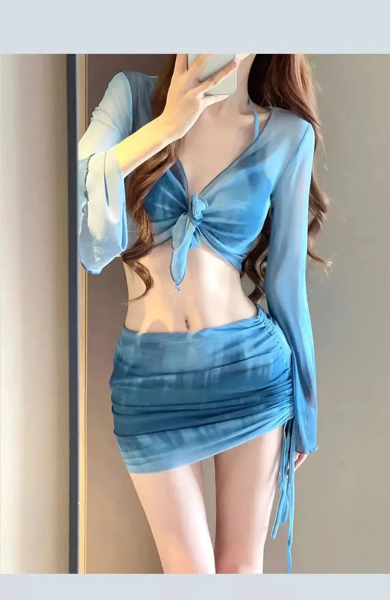 Women's four-piece high waist bikini set in blue and pink with skirt and backless top