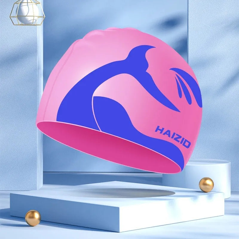 Silicone swimming cap with whale tail design and waterproof ear protectors in multiple colour options