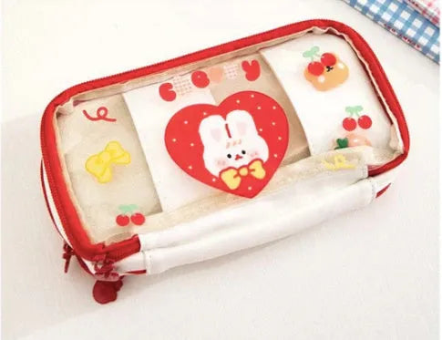 Transparent TPU pencil case with pink cake rabbit and red love rabbit designs for school stationery storage