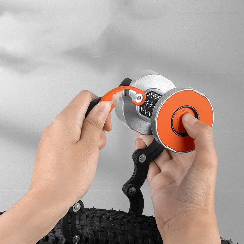 Black and orange portable folding bicycle lock constructed from zinc alloy and steel