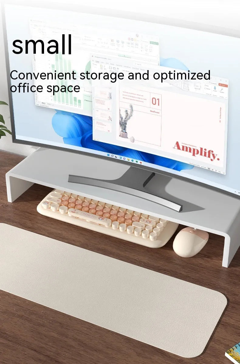 Pink wireless keyboard and mouse set with compact design on a desk
