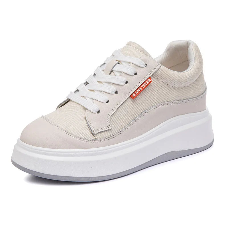 Women's beige leather thick-soled casual board shoes on a white background.