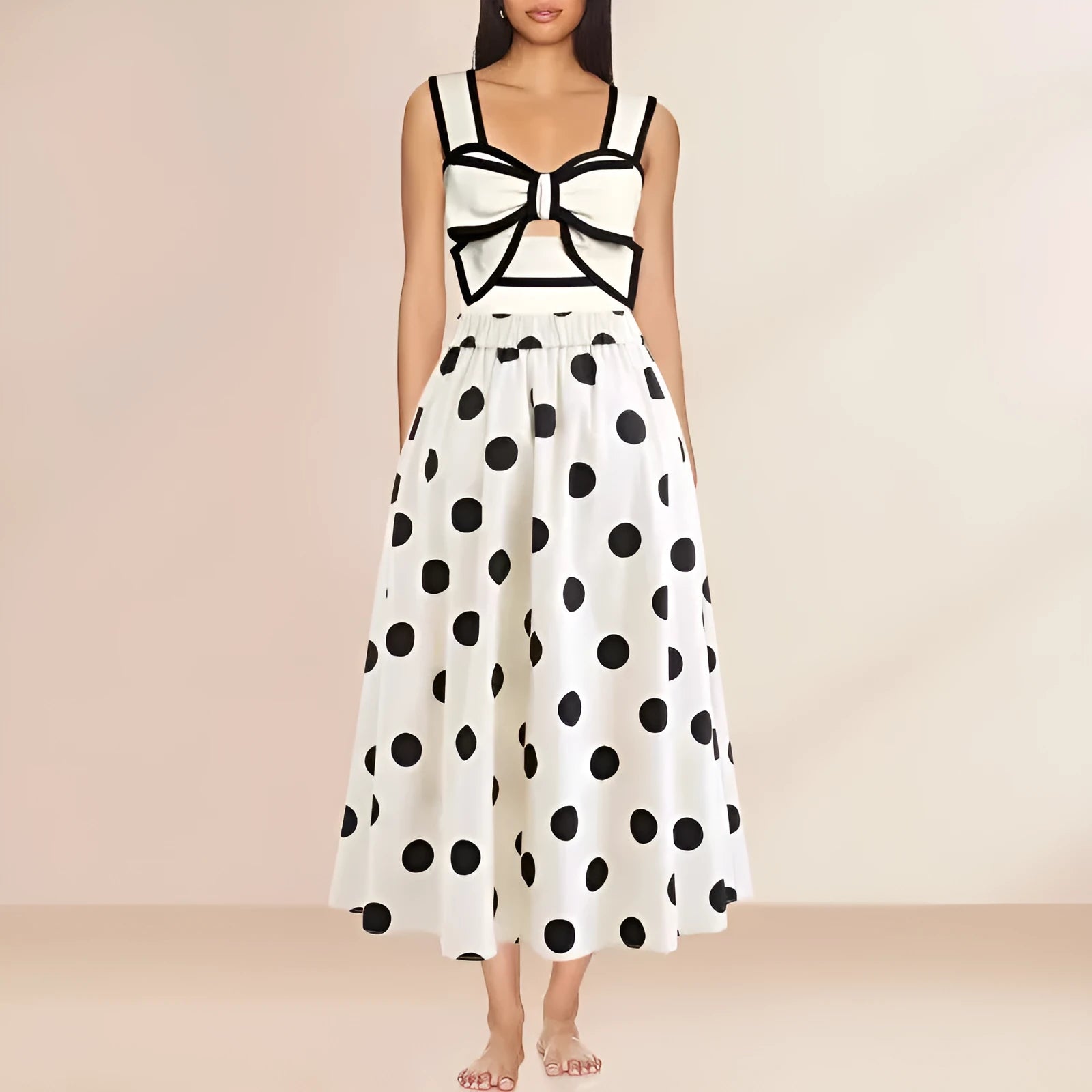 Female one-piece swimsuit with round skirt and bow detail in black or white polyester fabric for swimming and beach wear
